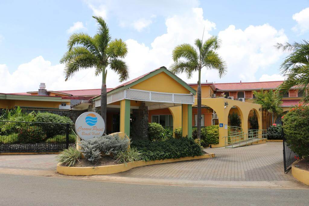 This photo shows the front entrance of Crown Point Beach Hotel