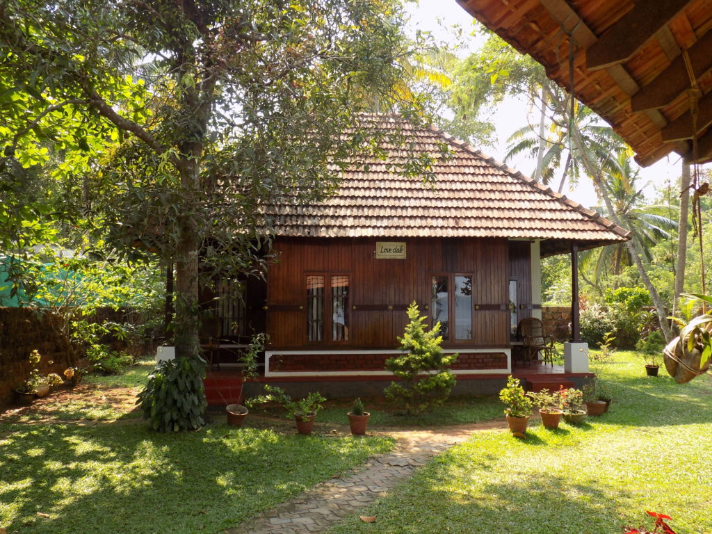 This photo shows our accommodation at Lovedale - an individual cabin in the grounds with a steep pitched roof