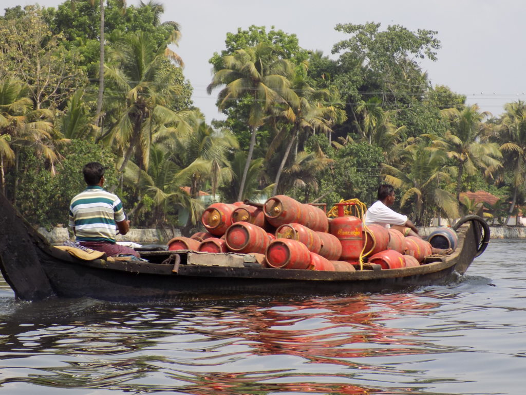 This photo shows gas bottles piled up in the middle of a boat