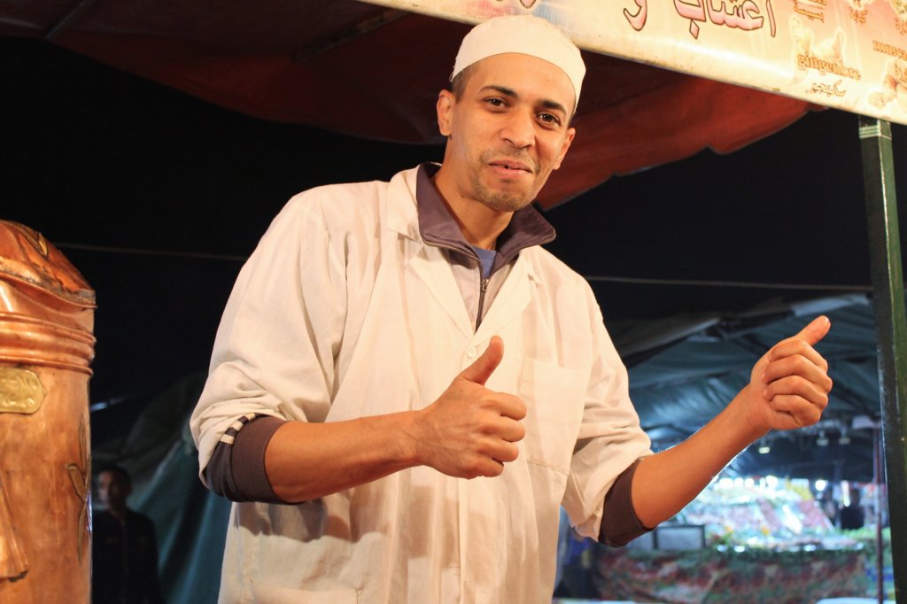 This photo shows a happy smiling digestif seller!