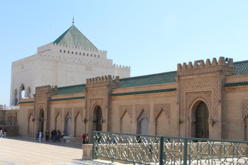 This photo shows the marble mausoleum with its pointed roof